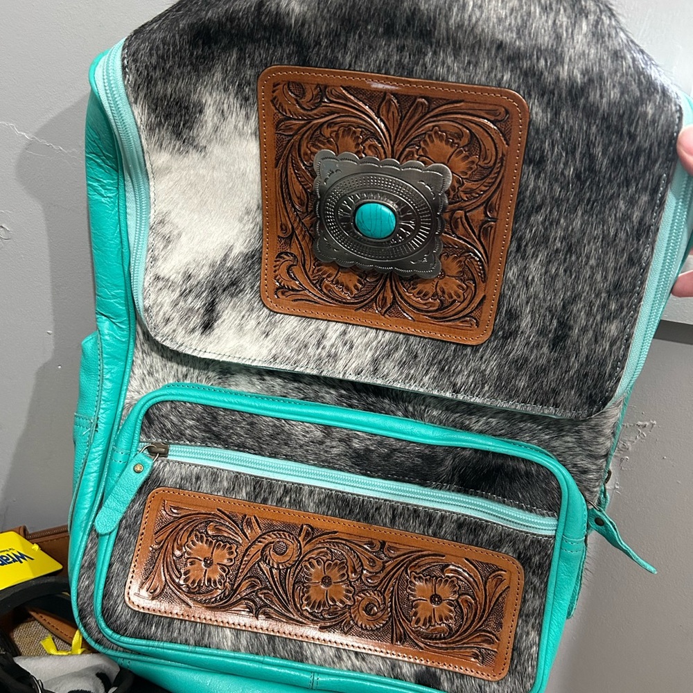 Turquoise and Cowhide Backpack with Leather Accents